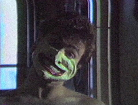 [ Fig. 06 ] <i>Portrait de John Mingolla</i> (video still), 1985.